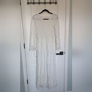White lace dress with long sleeves